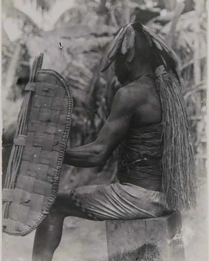 An Igbo Elder from Awka, Wearing a War Helmet and Holding a Shield