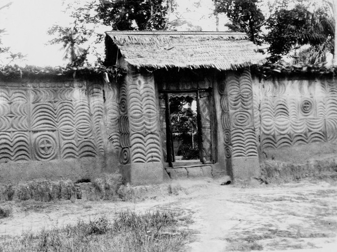 Entrance to an Igbo farmer's house with decorated mud walls